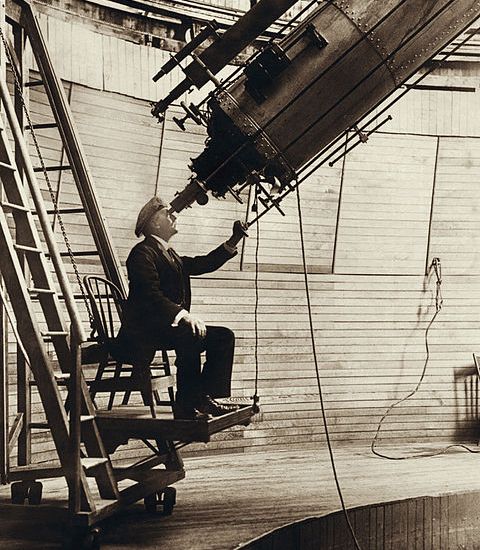 Lowell observing Venus in the Lowell Observatory, 1914.
